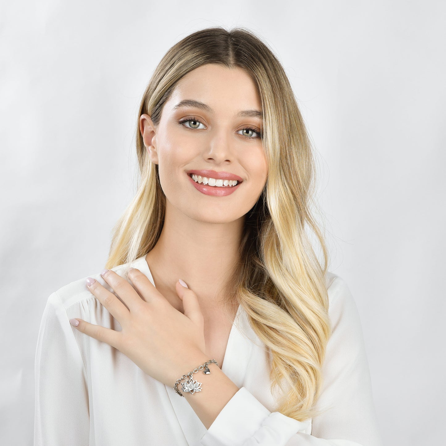 BRACCIALE DONNA IN ACCIAIO CON FIORE DI LOTO CON CRISTALLI BIANCHI