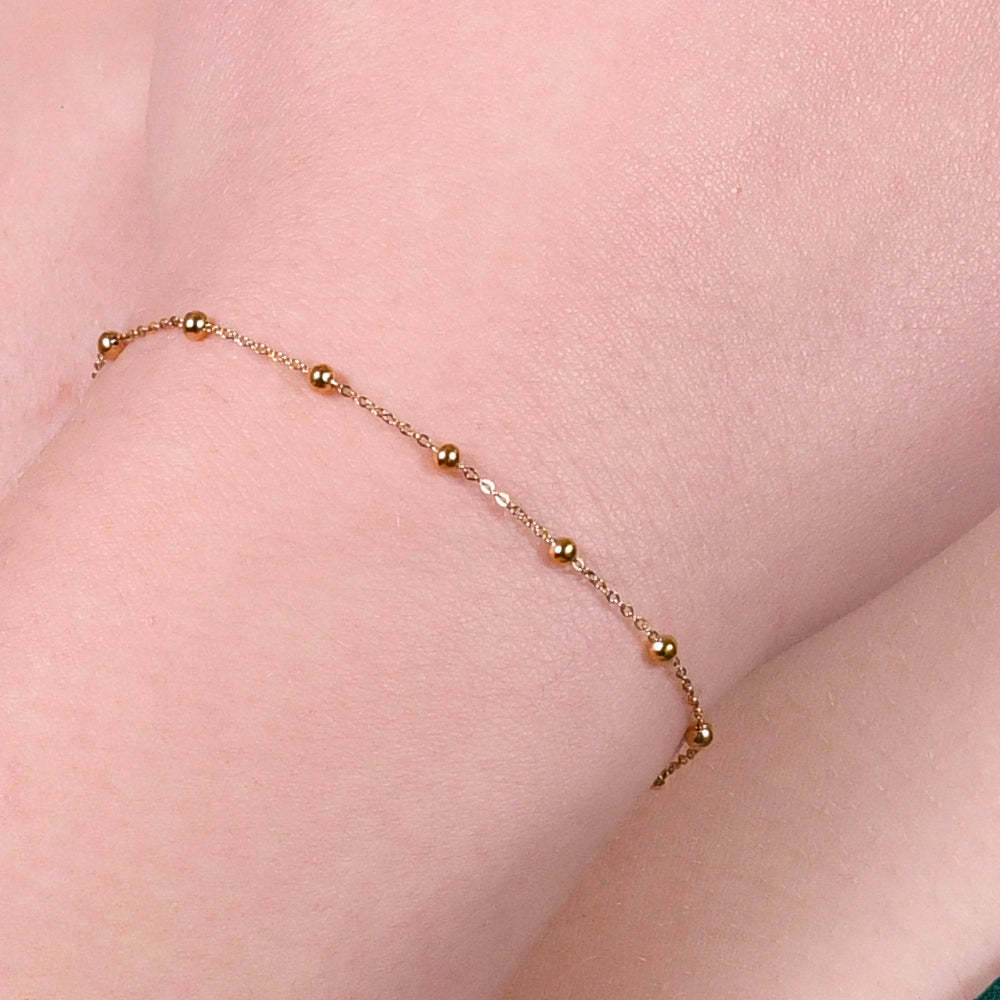 BRACCIALE DONNA IN ACCIAIO CON SFERE IP GOLD