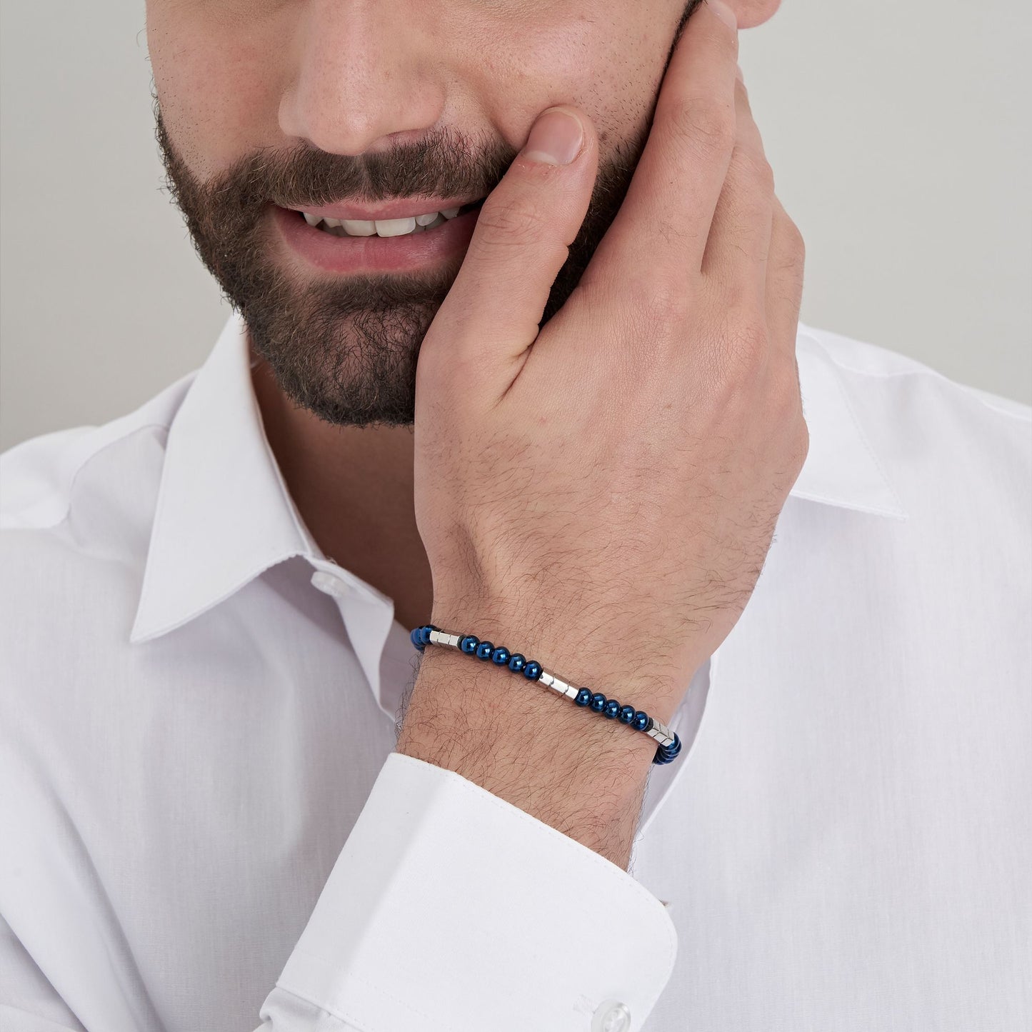 BRACCIALE UOMO IN ACCIAIO CON PIETRE BLU ED ELEMENTI IN ACCIAIO