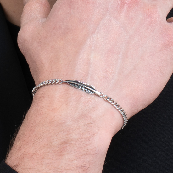 BRACCIALE UOMO IN ACCIAIO CON PIUMA