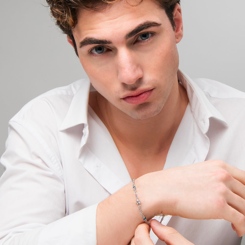 BRACCIALE UOMO IN ACCIAIO CON ROSA DEI VENTI ED ELEMENTI IN IP BLU