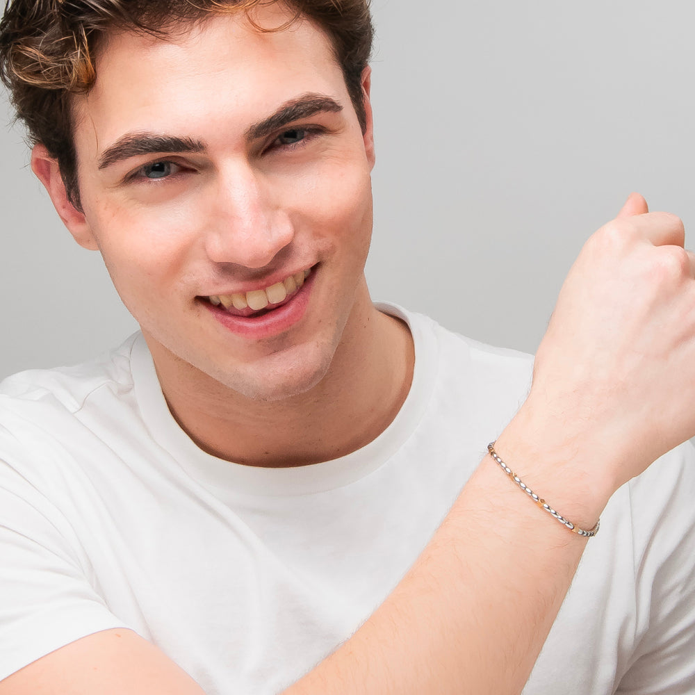 BRACCIALE UOMO IN ACCIAIO CON ELEMENTI IN EMATITE IP GOLD