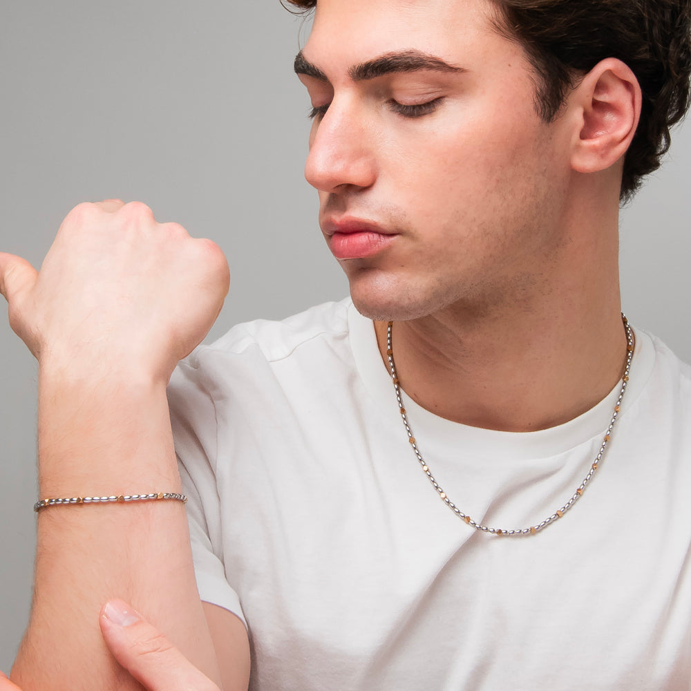 BRACCIALE UOMO IN ACCIAIO CON ELEMENTI IN EMATITE IP GOLD