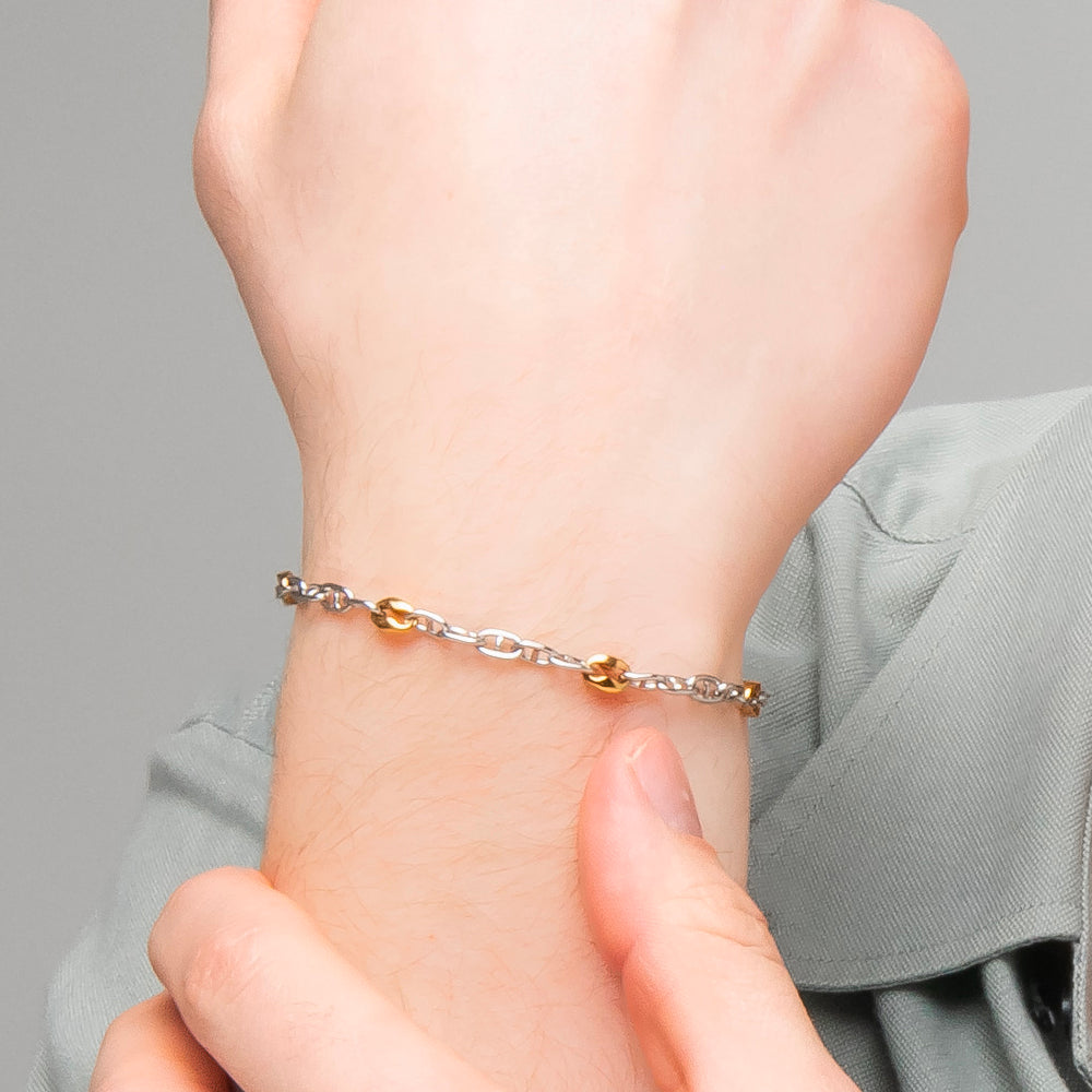 BRACCIALE UOMO IN ACCIAIO CON ELEMENTI IN ACCIAIO IP GOLD