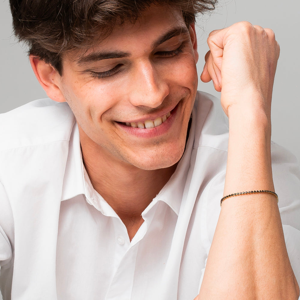 BRACCIALE UOMO IN ACCIAIO IP GOLD CON ZIRCONI NERI