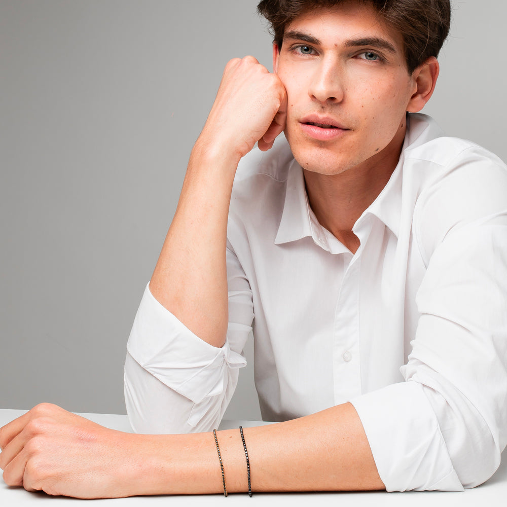 BRACCIALE UOMO IN ACCIAIO IP GOLD CON ZIRCONI NERI