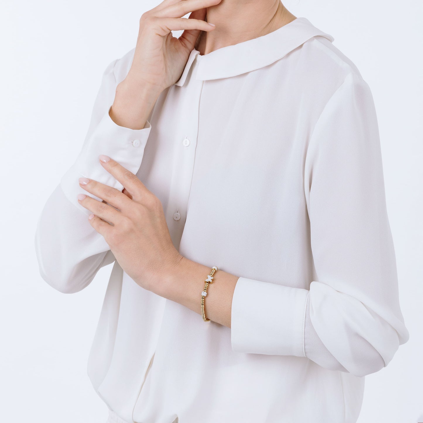 BRACCIALE IN ACCIAIO IP GOLD CON FARFALLA CON CRISTALLI BIANCHI
