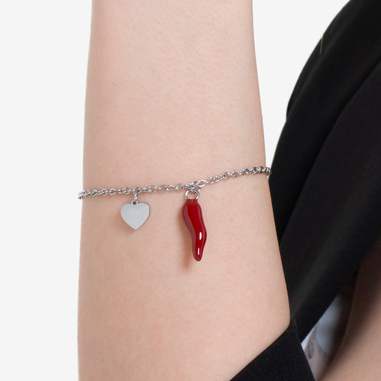 BRACCIALE DONNA IN ACCIAIO CON CUORE E CORNO ROSSO