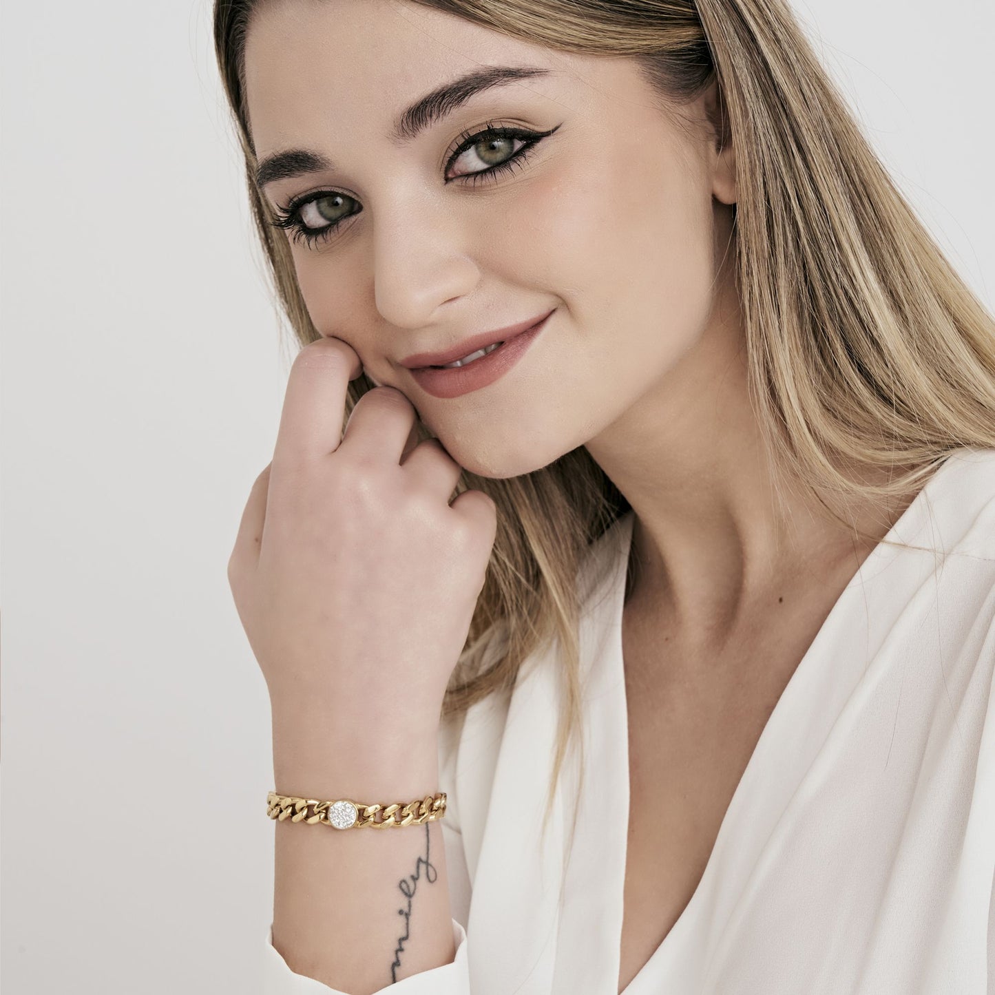 BRACCIALE DONNA IN ACCIAIO DORATO CON ELEMENTO E CRISTALLI BIANCHI