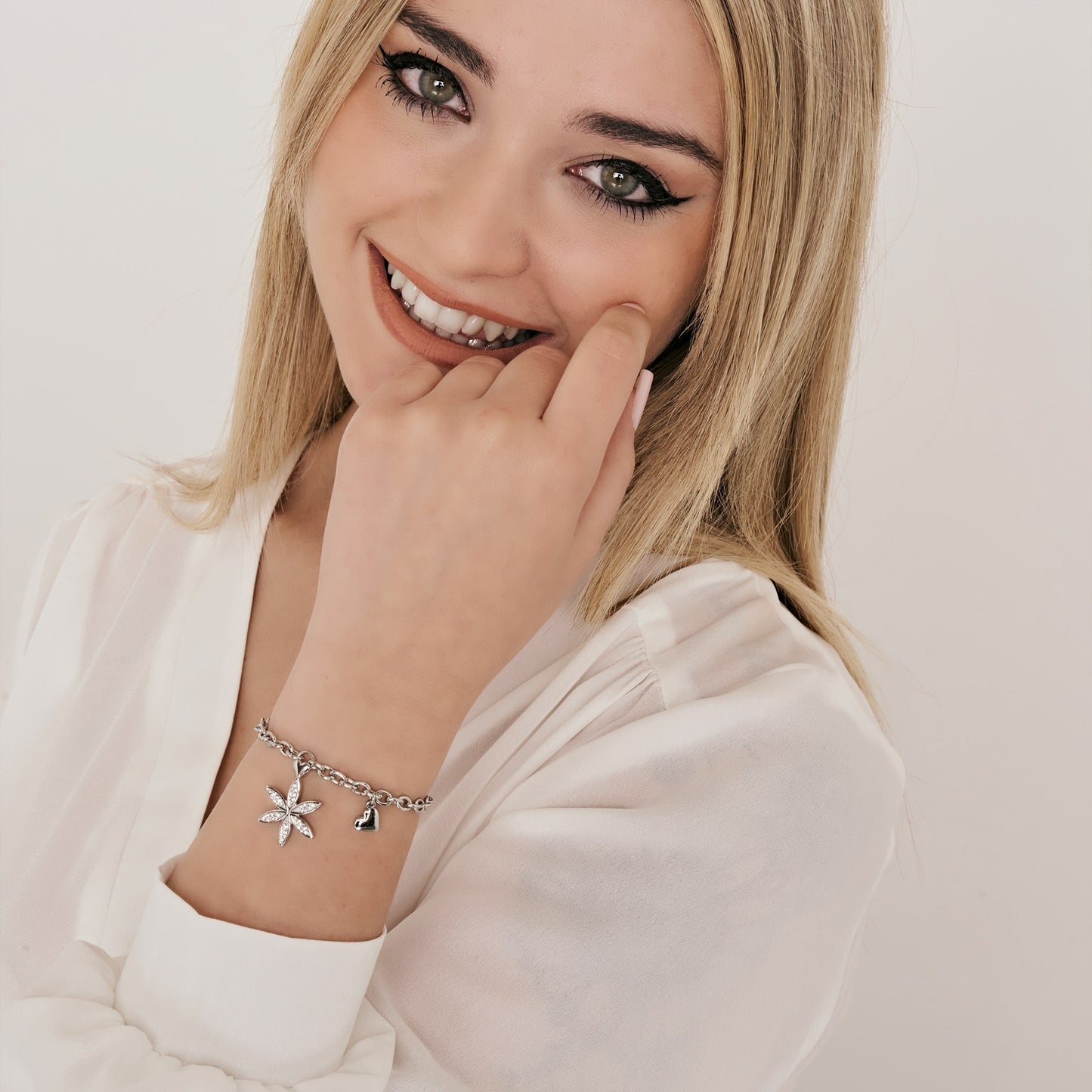 BRACCIALE DONNA IN ACCIAIO CON FIORE DELLA VITA CON CRISTALLI BIANCHI