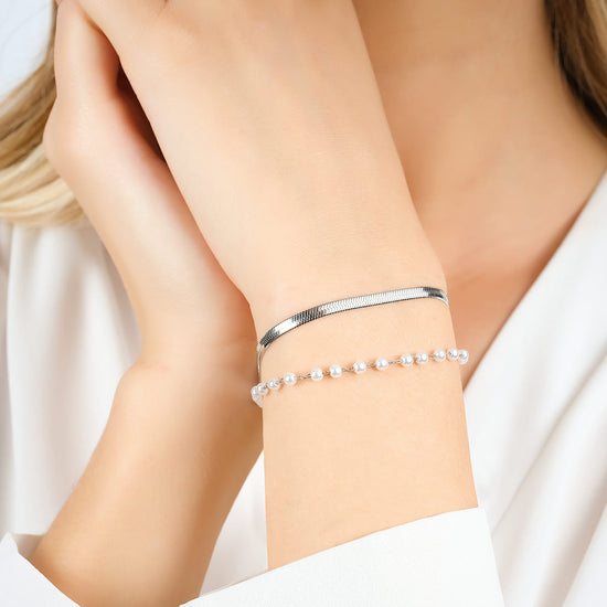 BRACCIALE DONNA IN ACCIAIO CON PERLE BIANCHE