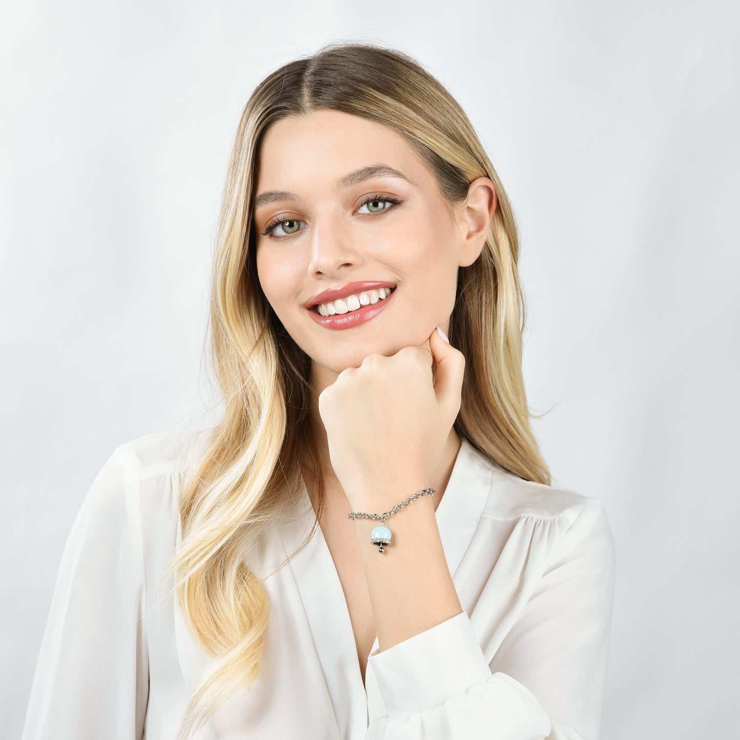 BRACCIALE DONNA IN ACCIAIO CON CAMPANELLA CON SMALTO TURCHESE E CRISTALLI