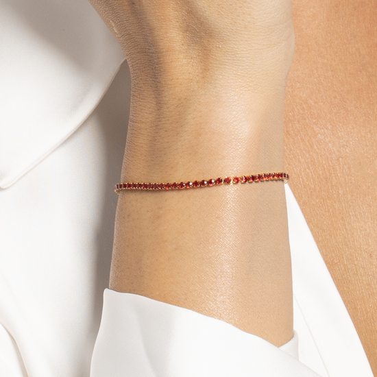 BRACCIALE TENNIS DONNA IN ACCIAIO COLORE ORO CON ZIRCONI ROSSI