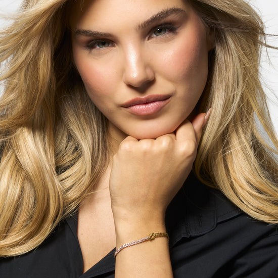 BRACCIALE DONNA IN ACCIAIO IP GOLD CON NODO E ZIRCONI ROSA