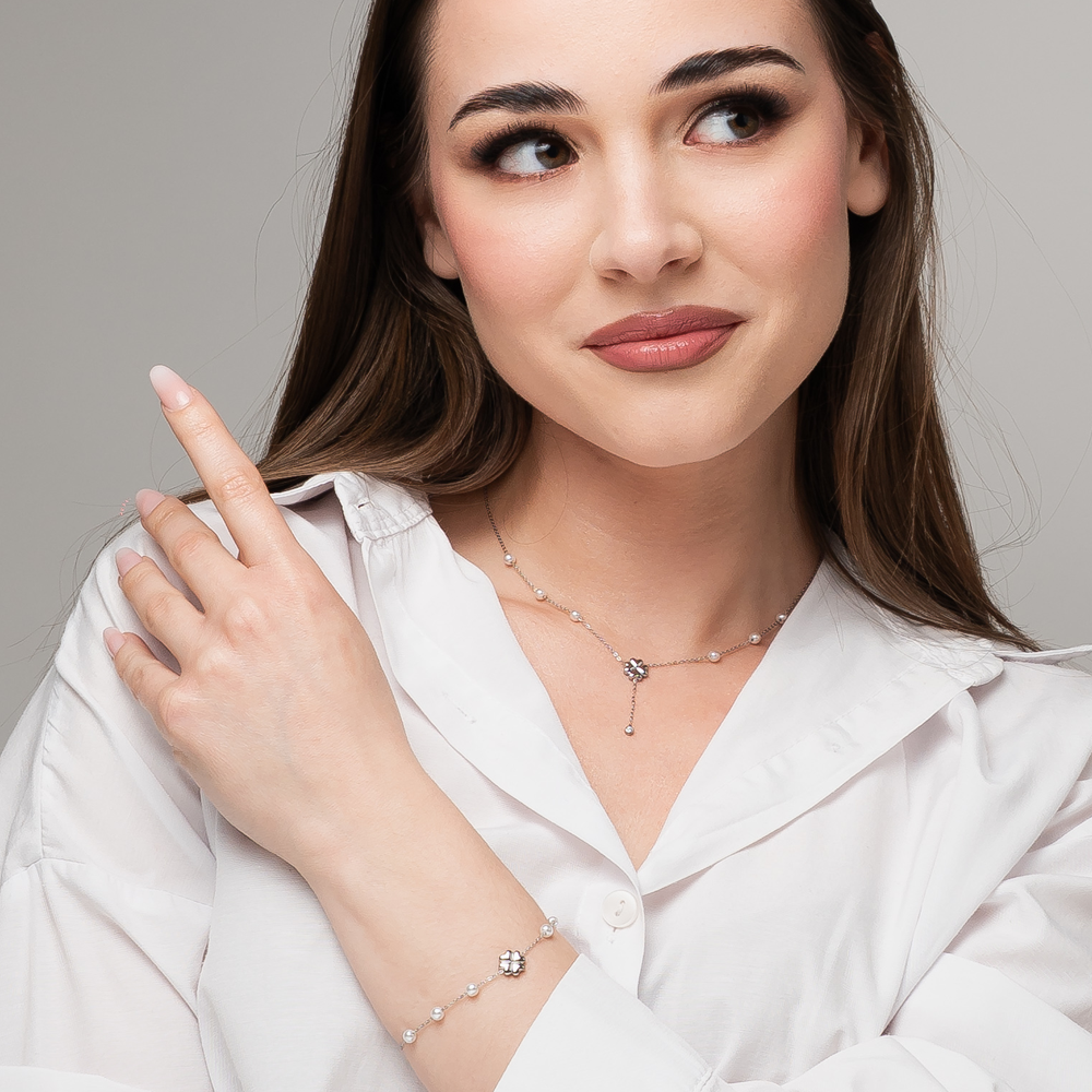 WOMEN'S STEEL BRACELET WITH PEARLS AND FOUR-LEAF CLOVER