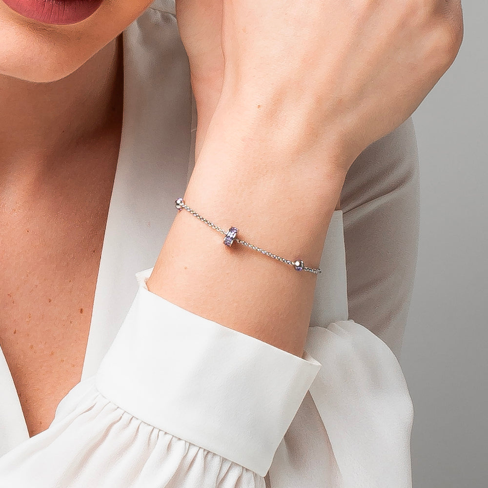 BRACCIALE DONNA IN ACCIAIO, BUSSOLOTTO ED ELEMENTI CON ZIRCONI VIOLA
