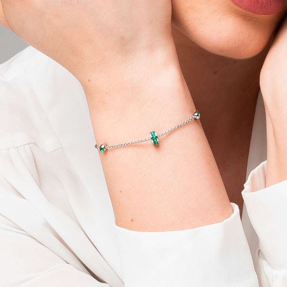 BRACCIALE DONNA IN ACCIAIO, BUSSOLOTTO ED ELEMENTI CON ZIRCONI VERDI