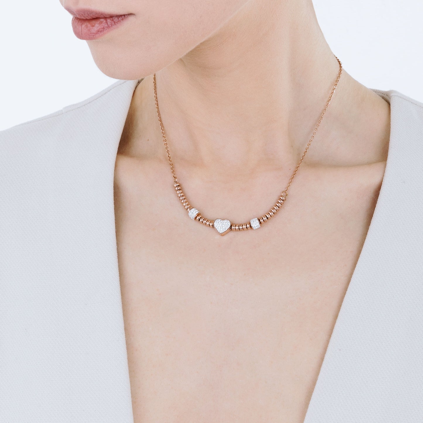 COLLANA IN ACCIAIO IP ROSE CON CUORE CON CRISTALLI BIANCHI
