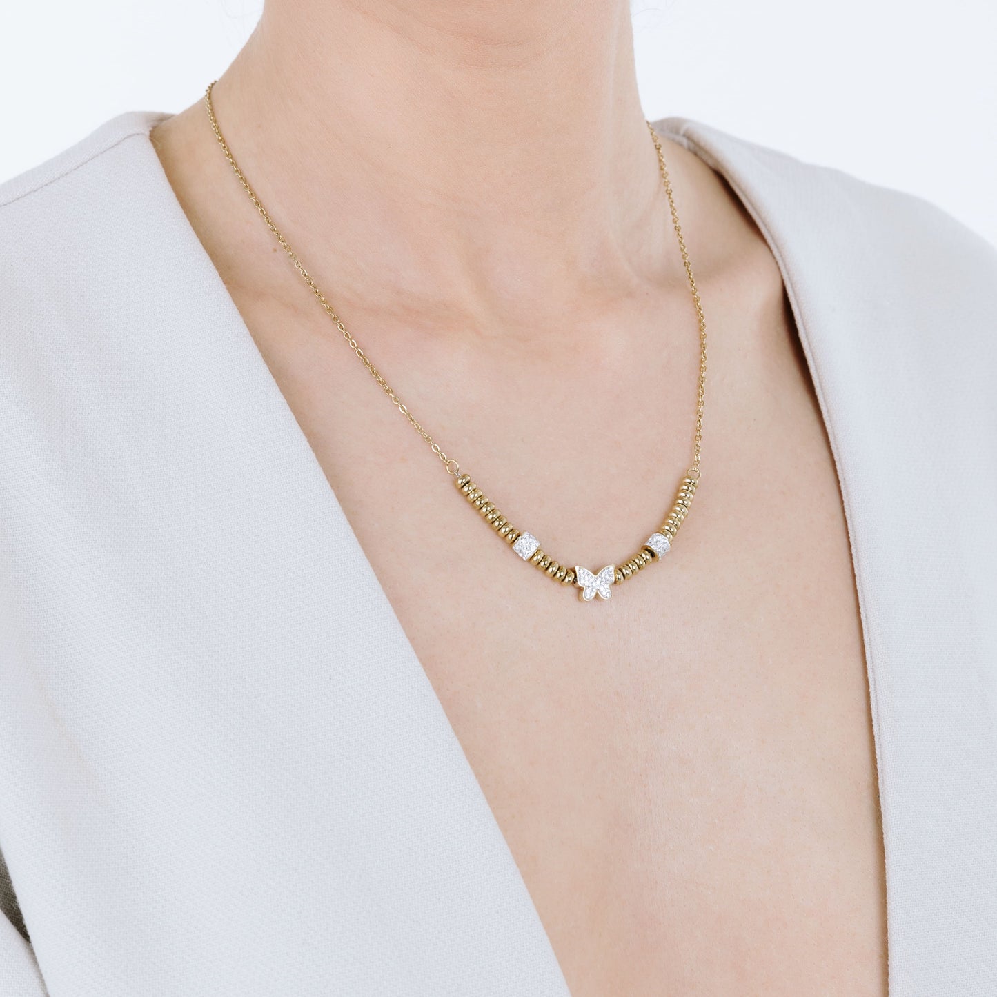 COLLANA IN ACCIAIO IP GOLD CON FARFALLA CON CRISTALLI BIANCHI