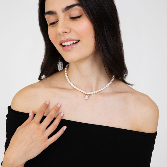 COLLANA DI PERLE BIANCHE DONNA CON ANGELO