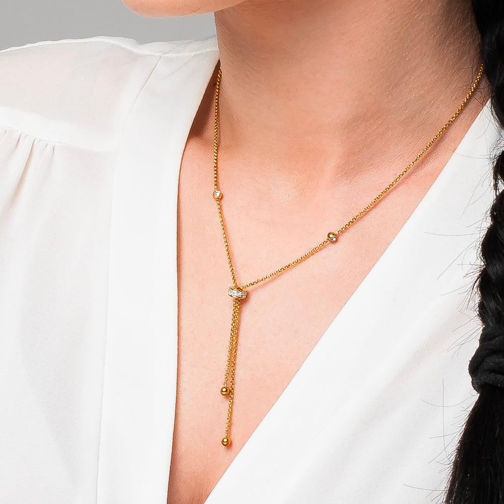 COLLANA DONNA IN ACCIAIO IP GOLD, BUSSOLOTTO ED ELEMENTI CON ZIRCONI BIANCHI
