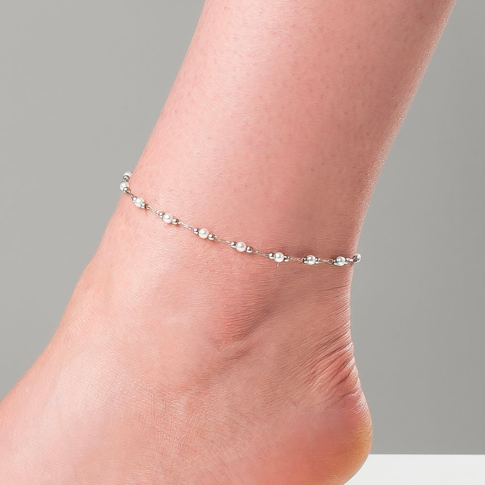 CAVIGLIERA DONNA IN ACCIAIO CON PERLE BIANCHE