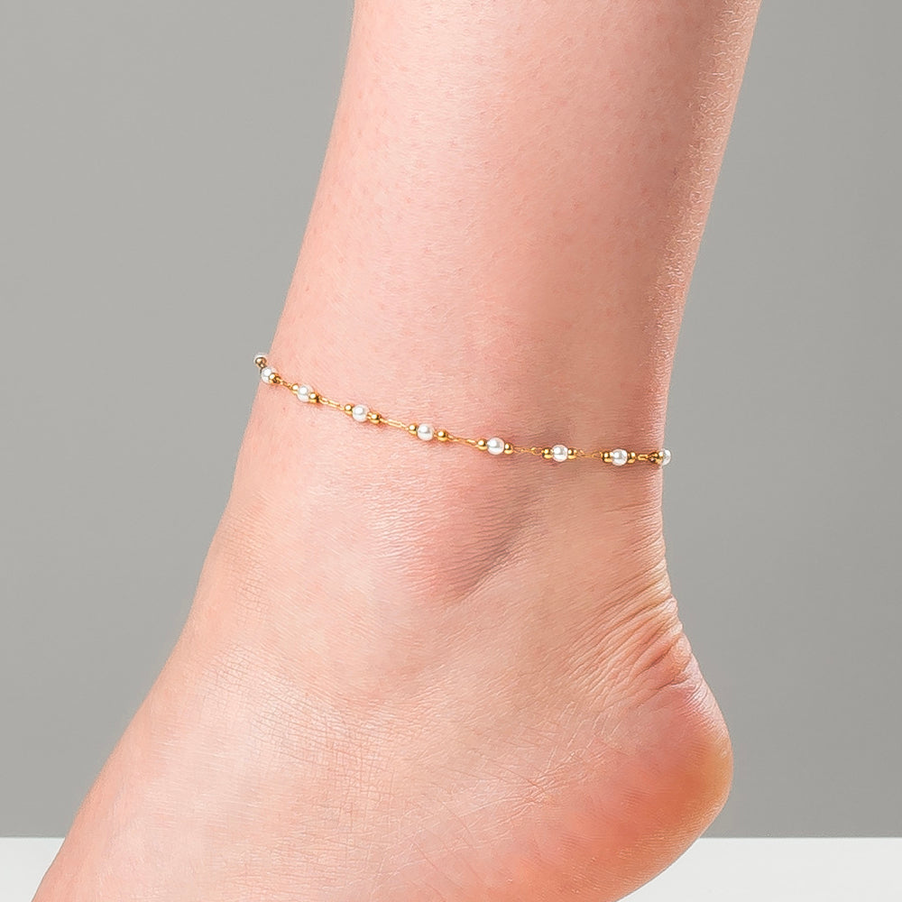 CAVIGLIERA DONNA IN ACCIAIO IP GOLD CON PERLE BIANCHE