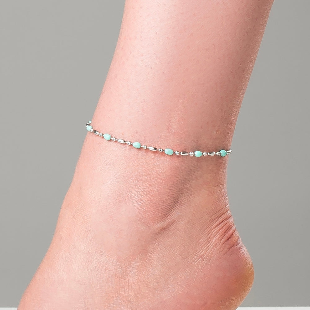 CAVIGLIERA DONNA IN ACCIAIO, ELEMENTI CON SMALTO TURCHESE