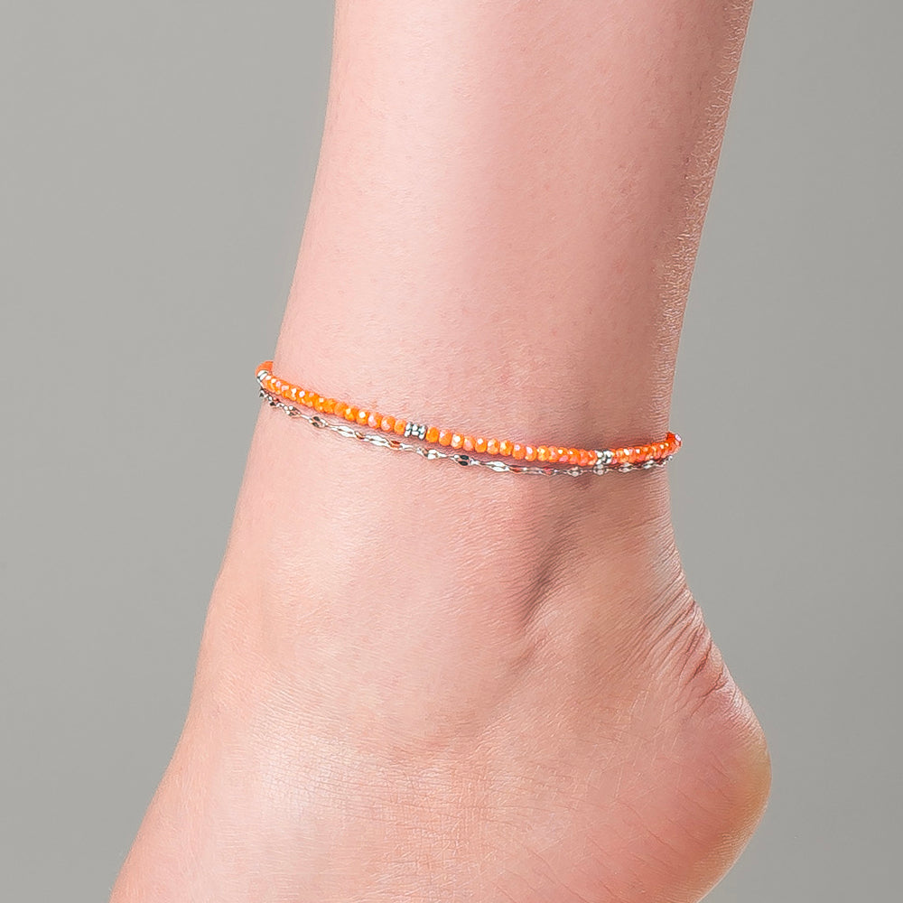 CAVIGLIERA DONNA IN ACCIAIO CON CRISTALLI ARANCIONI