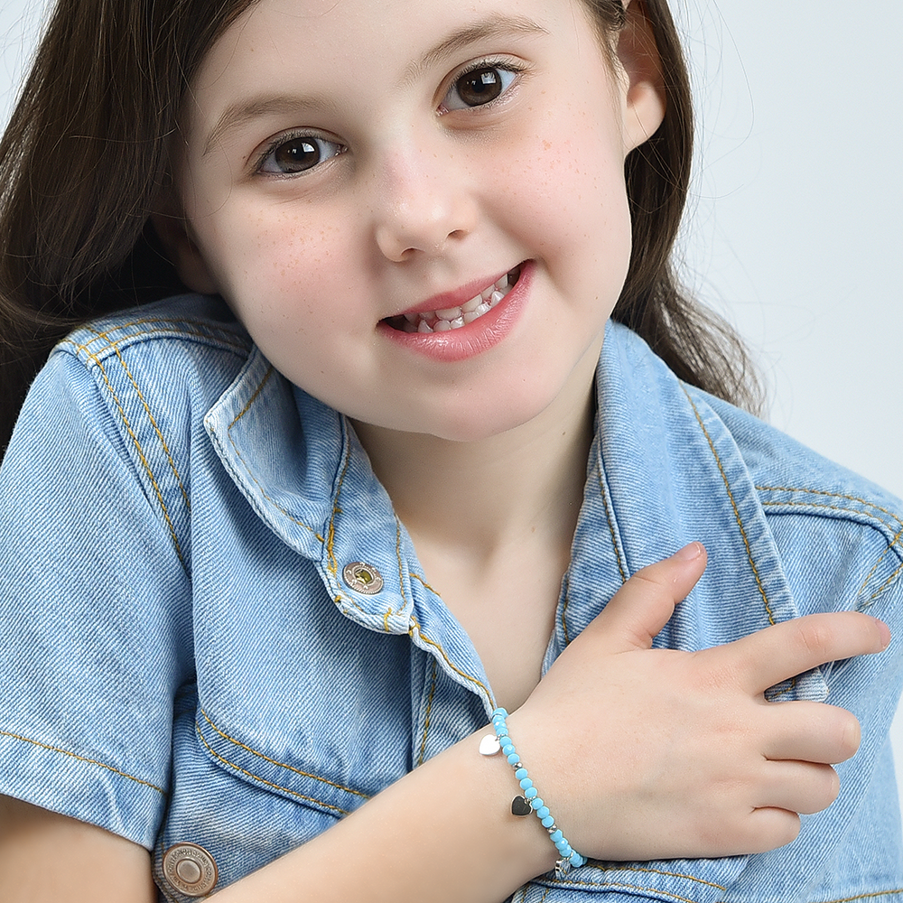 BRACCIALE BAMBINA IN ACCIAIO CON PIETRE TURCHESI E CUORI