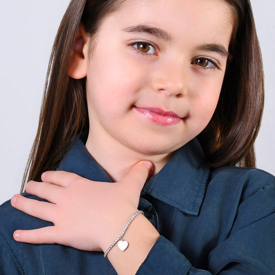 BRACCIALE TENNIS BAMBINA IN ACCIAIO CON CRISTALLI BIANCHI E CUORE