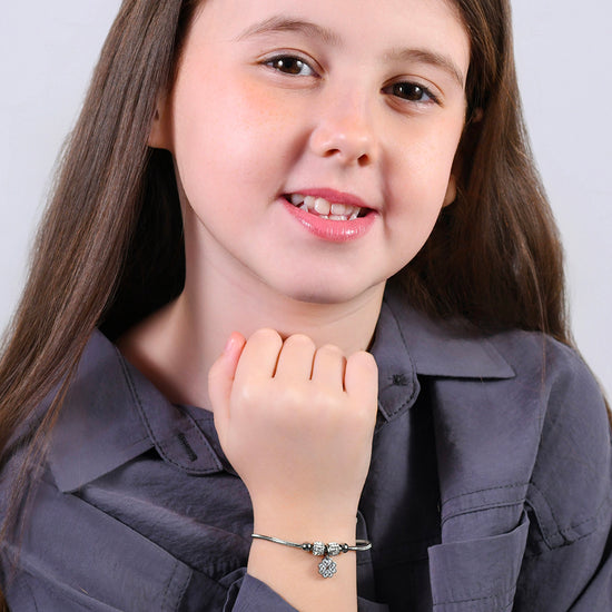 BRACCIALE BAMBINA IN ACCIAIO CON QUADRIFOGLIO CON CRISTALLI BIANCHI