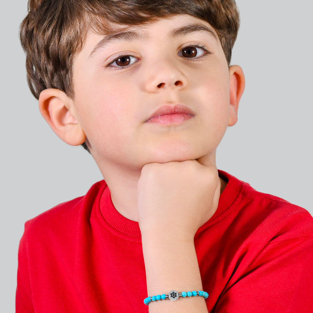BRACCIALE BAMBINO IN ACCIAIO TIMONE CON PIETRE TURCHESI