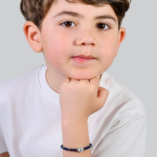 BRACCIALE BAMBINO IN ACCIAIO ANCORA CON PIETRE BLU