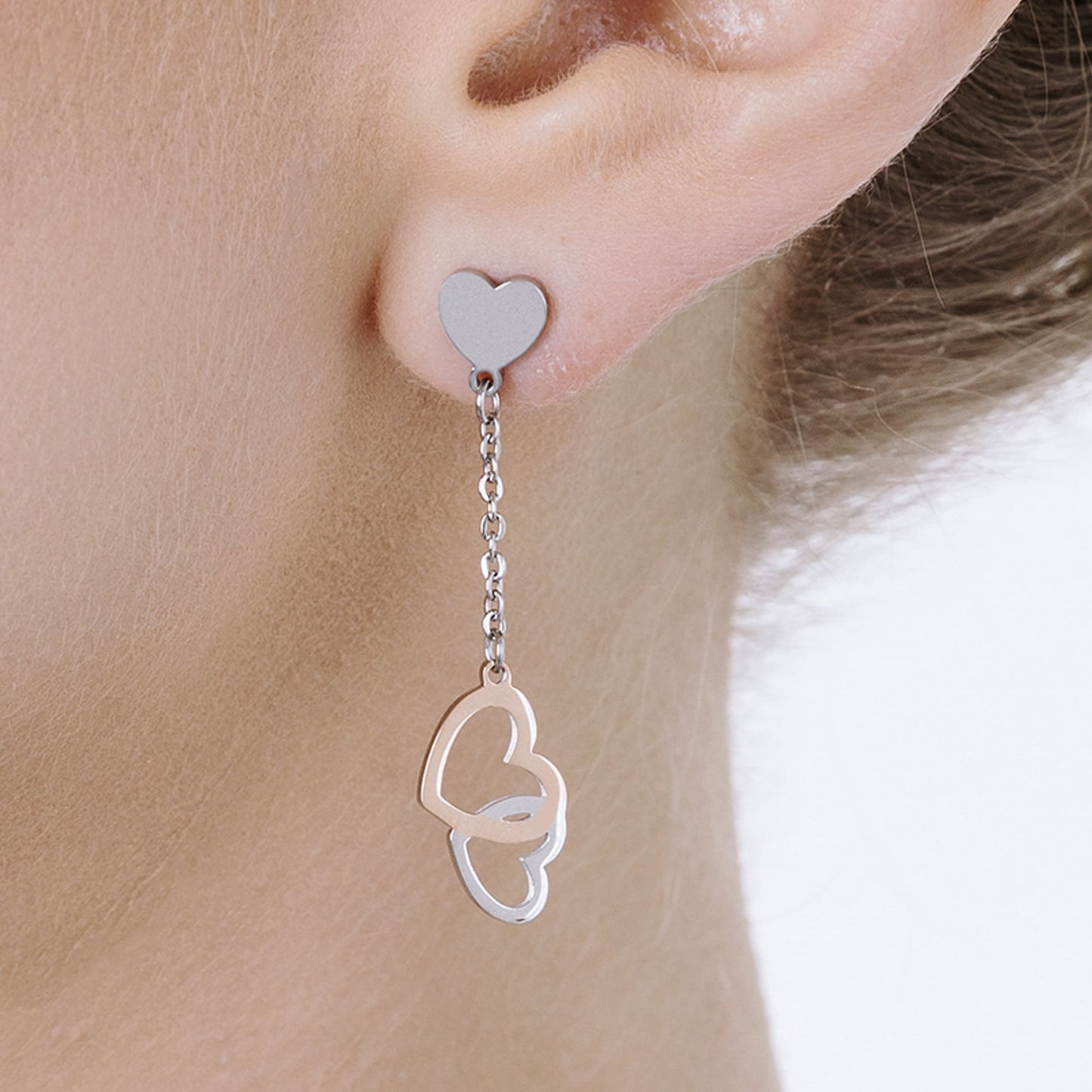 ORECCHINI IN ACCIAIO CON CUORI IN ACCIAIO E ACCIAIO IP ROSE