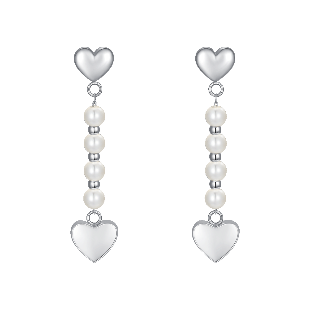 Orecchini in Argento Con Perla Bianca Fotografia Stock - Immagine di Orecchini in Argento Con Perla Bianca Fotografia Stock - Immagine di