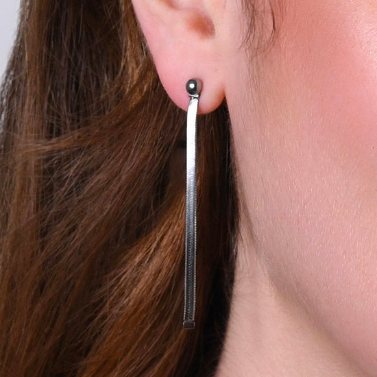 MONO ORECCHINO DONNA IN ACCIAIO CON SFERE