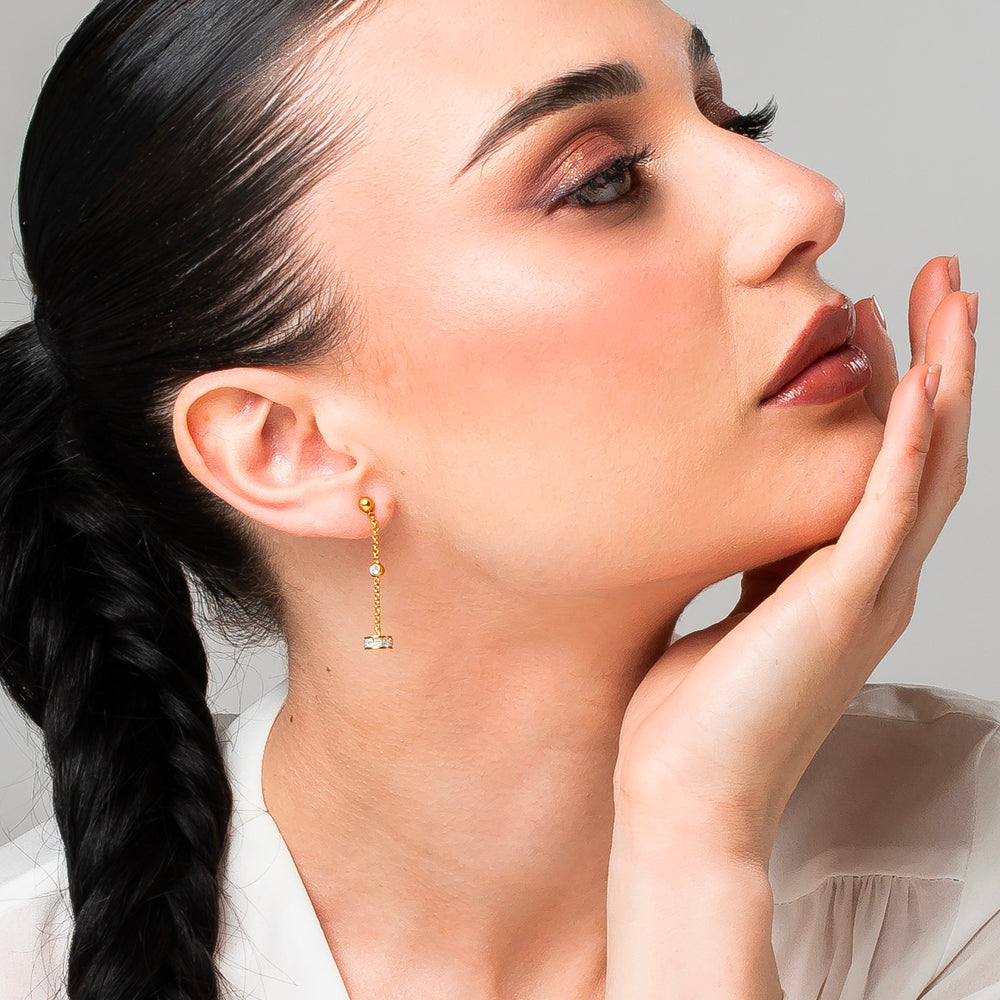 ORECCHINI DONNA IN ACCIAIO IP GOLD, BUSSOLOTTO ED ELEMENTI CON ZIRCONI BIANCHI