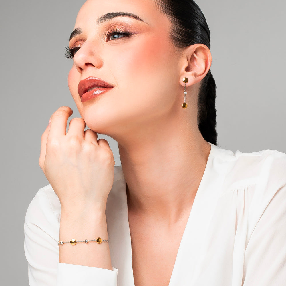 ORECCHINI DONNA IN ACCIAIO CON ELEMENTI IN ACCIAIO IP GOLD E CRISTALLI BIANCHI